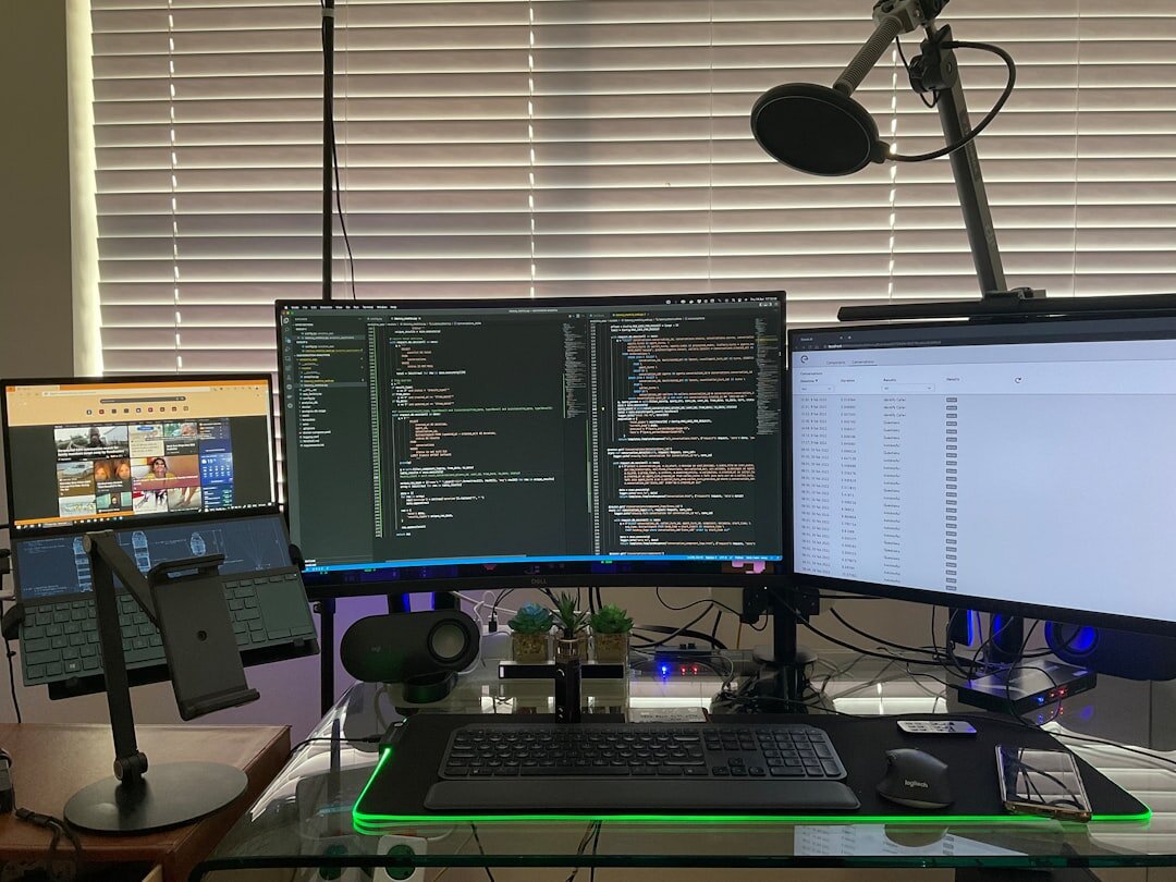 Newsroom desk with monitors displaying entertainment coverage