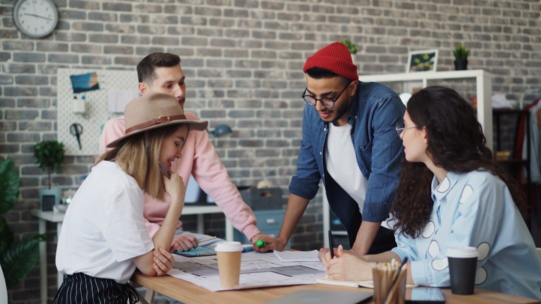 Editorial team collaborating around a table